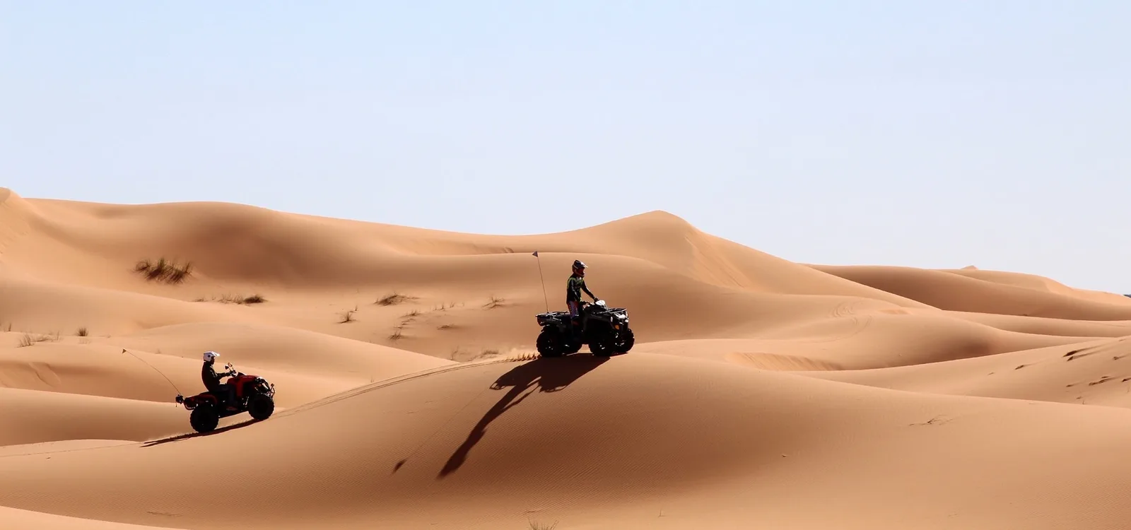 Quad Bikers Racing the Dunes